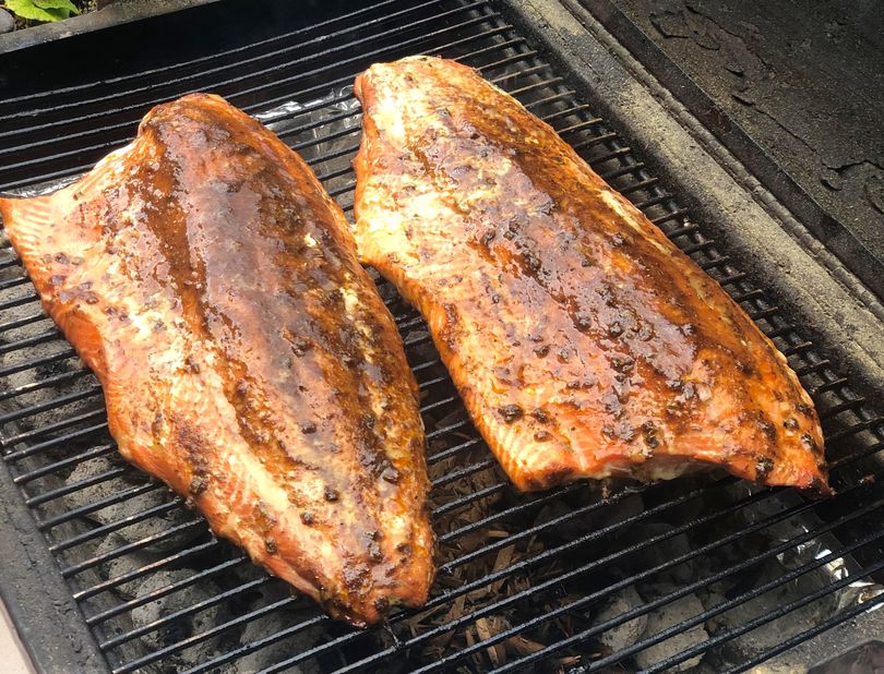 Grilled salmon cooked over charcoal and alder chips is a perfect way to celebrate Labor Day weekend. (Leslie Kelly)