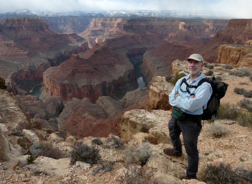 Outdoors editor Rich Landers poses on the rim of the Grand Canyon overlooking the Colorado River bend around Point Hansbrough after hiking up from Eminence Camp at River Mile 44  (Rich Landers)