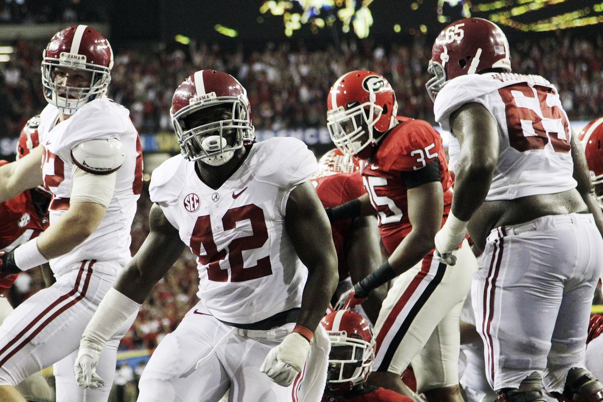 Alabama and running back Eddie Lacy (42) take aim at third title in past four seasons. (Associated Press)
