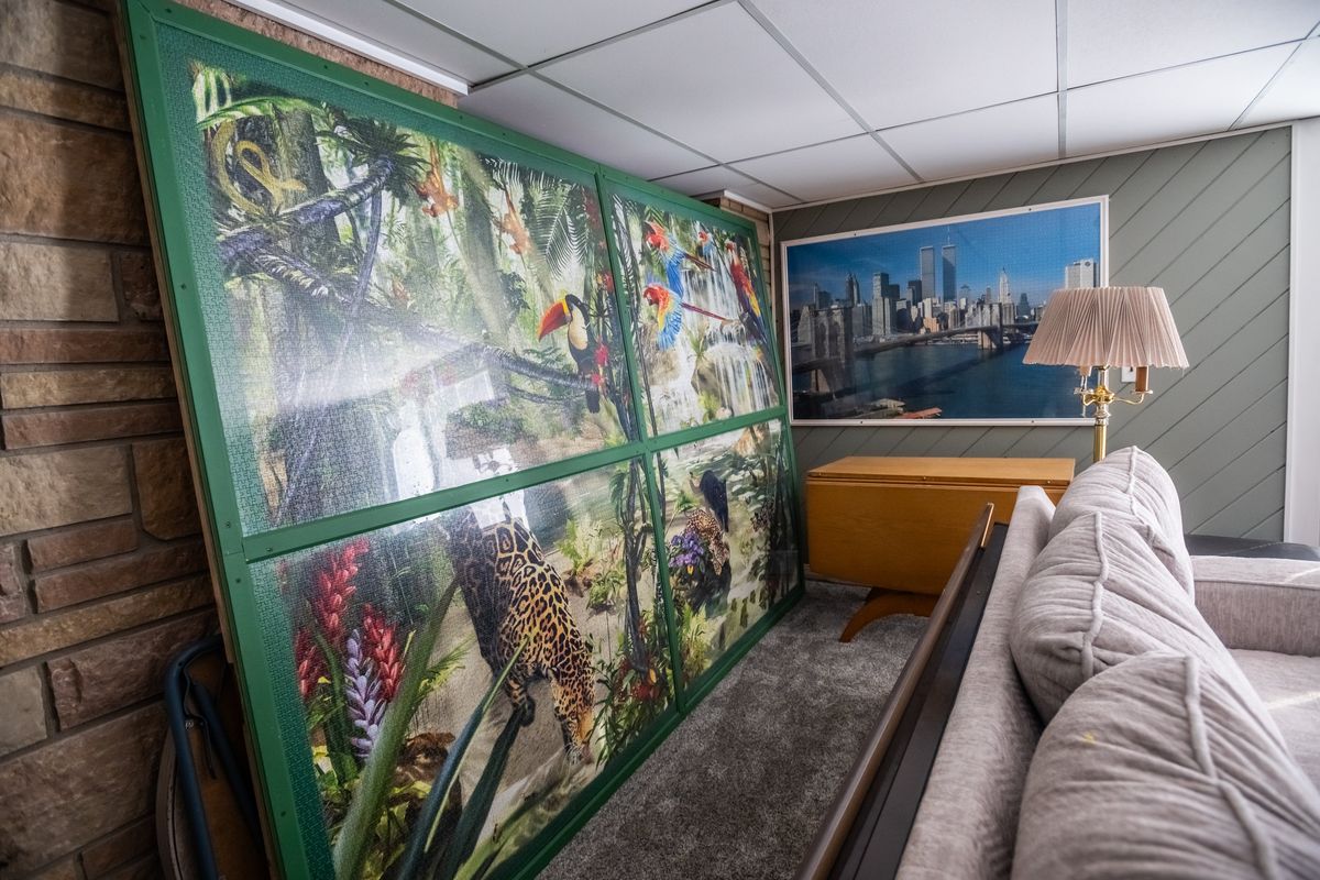 Two of the puzzles that are framed and on display at Linda Groskreutz’s home. MUST CREDIT: Caroline Yang/For The Washington Post  (Caroline Yang/For The Washington Post)