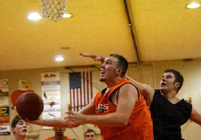 West Valley's Tyler Hobbs, left, provides leadership and maturity for the Eagles.
(Liz Kishimoto / The Spokesman-Review)