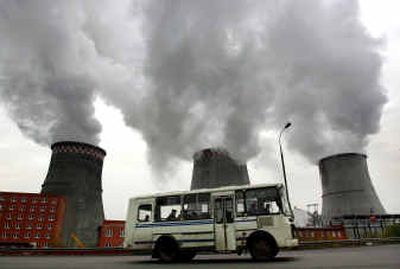 
Steam and smoke rise from cooling towers on the outskirts of Moscow on Oct. 22.
 (File/Associated Press / The Spokesman-Review)