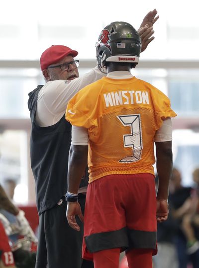 Tampa Bay Buccaneers head coach Bruce Arians talks to quarterback Jameis Winston (3) during an NFL football training camp practice Friday, July 26, 2019, in Tampa, Fla. (Chris O’Meara / Associated Press)