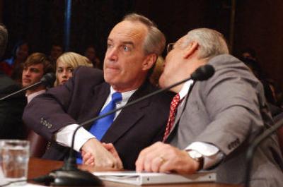 Secretary of the Interior nominee Idaho Gov. Dirk Kempthorne, left, listens to Sen. Larry Craig, R-Idaho, at Thursday's Senate committee hearing on Kempthorne's nomination. 
 (Associated Press / The Spokesman-Review)