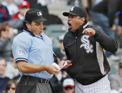 
Chicago White Sox manager Ozzie Guillen argues with home-plate umpire Phil Cuzzi. Associated Press
 (Associated Press / The Spokesman-Review)