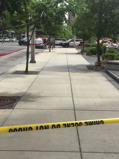 Police respond to a stabbing at Howard and Riverside in downtown Spokane on Saturday, June 17, 2017. (Nina Culver)