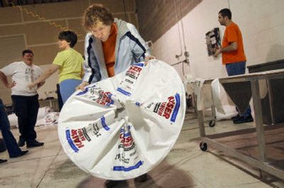 
Nova workers fill work orders at F.O. Berg in Spokane Valley. Berg will hire more Nova workers to help fill a tent contract for the military. 
 (Photos by Brian Plonka/ / The Spokesman-Review)
