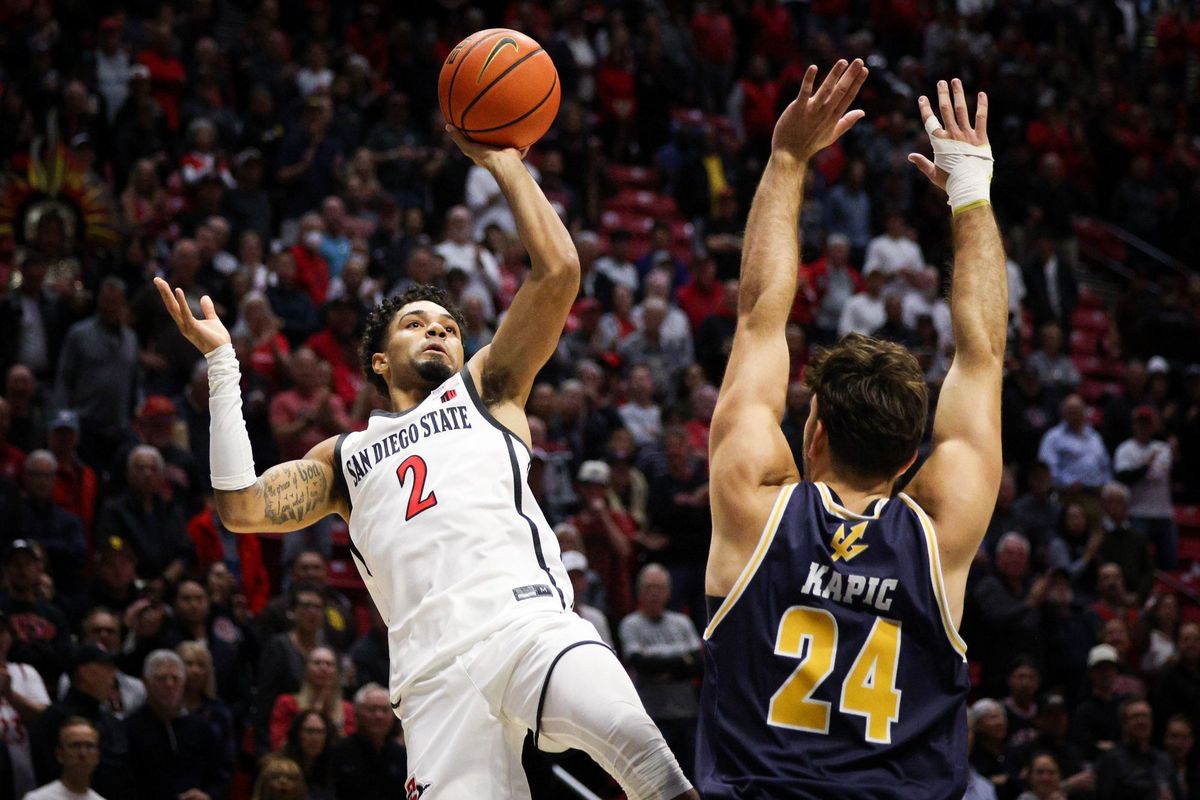 San Diego State guard Nick Boyd shoots against UC San Diego forward Nordin Kapic on Nov. 6 at Viejas Arena in San Diego.  (Tribune News Service)