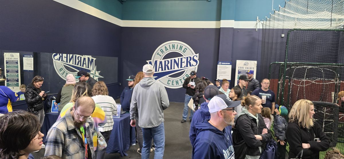 People crowd around the new Mariners Training Center, which opened to the public on Saturday.  (Justin Reed/The Spokesman-Review)