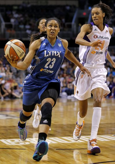 Minnesota’s Maya Moore filled the stat line with 26 points, 16 rebounds, five assists, two steals and a block to beat Phoenix. (Associated Press)