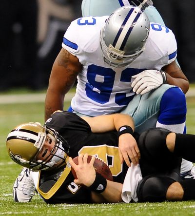 Saints QB Drew Brees was one of Cowboys linebacker Anthony Spencer’s six sacks last season. (Associated Press)