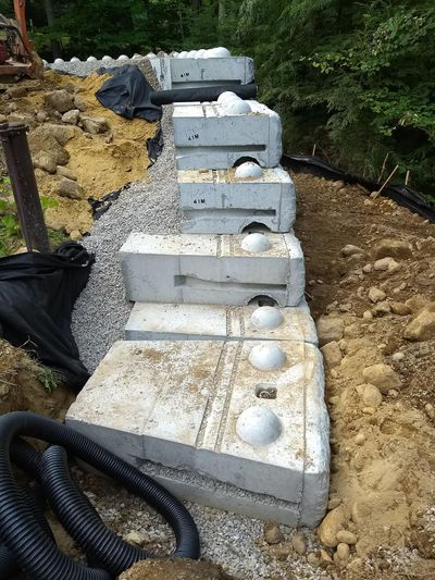 The giant precast-concrete retaining wall blocks stack and click together just like Lego blocks. (Tim Carter)