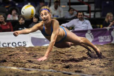 
April Ross makes a dig during a match for the AVP Crocs Hot Winter Nights Tour at Spokane Arena.
 (Rajah Bose / The Spokesman-Review)