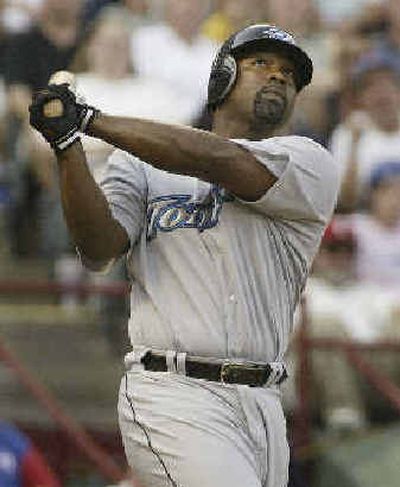 
In protest of the war in Iraq, Toronto's Carlos Delgado hasn't been standing when ballparks play 