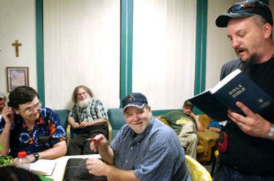 
Truth Ministries director Marty McKinney leads Bible study at the homeless shelter on West Sprague Avenue on Tuesday evening.
 (Holly Pickett photos/ / The Spokesman-Review)