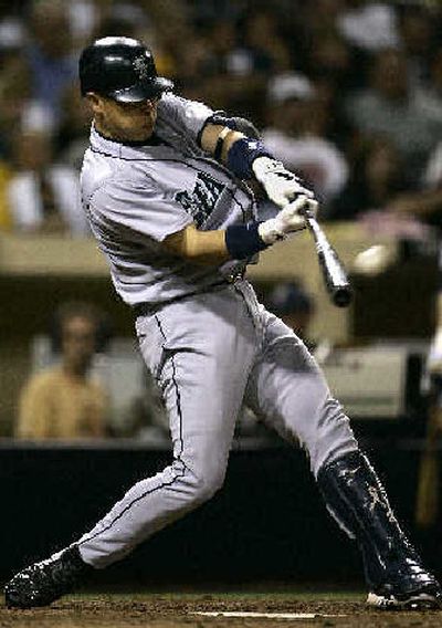 
Kenji Johjima connects for second of his two homers. 
 (Associated Press / The Spokesman-Review)