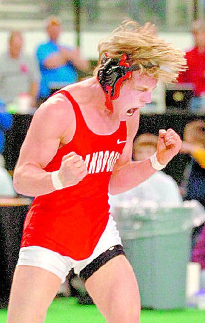 
Sandpoint's Joey Fio celebrates his championship at 125 pounds. 
 (Bill Schaefer Special to the S-R / The Spokesman-Review)