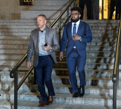 Dallas Cowboys star Ezekiel Elliott, right, exits federal court after a hearing Monday, Oct. 30, 2017 in New York. Elliott is seeking to have his six game suspension by the NFL postponed. (Craig Ruttle / Associated Press)