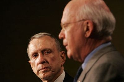 
Sens. Arlen Specter, R-Pa., left, and Patrick Leahy, D-Vt., discuss upcoming hearings on Judge Samuel Alito's nomination to the Supreme Court. 
 (Associated Press / The Spokesman-Review)