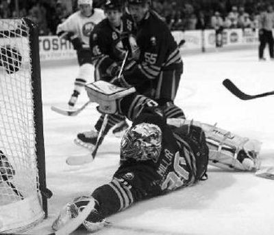 
Sabres goalie Ryan Miller makes key save during the final seconds of the game. 
 (Associated Press / The Spokesman-Review)