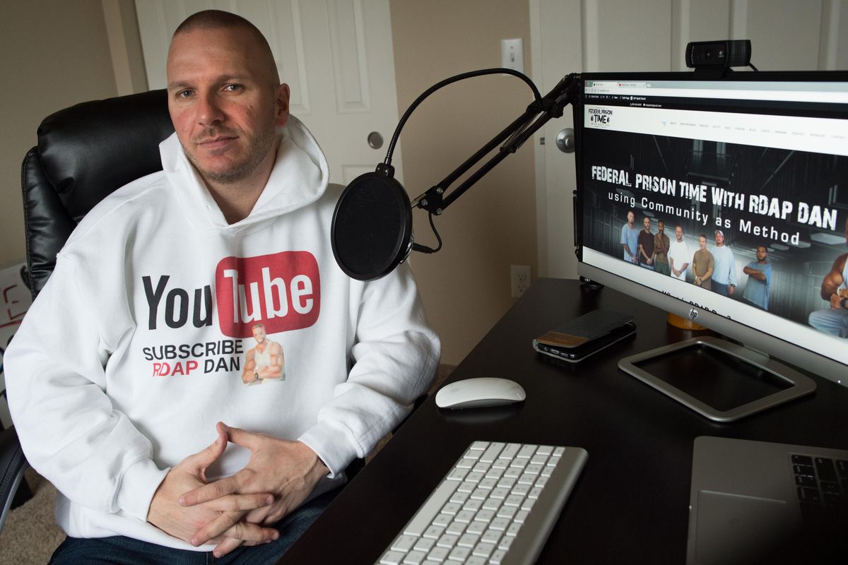 Daniel Wise poses for a photo March 15 in his home studio where he makes YouTube videos in which  he  coaches soon-to-be prisoners on what to expect while they’re serving time  at his home in Spokane Valley. (Tyler Tjomsland / The Spokesman-Review)