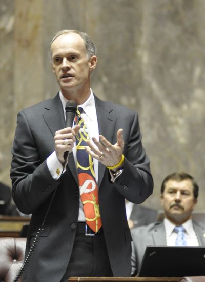 OLYMPIA -- Rodney Tom, D-Bellevue, the new Senate majority leader, makes a point during a debate on new rules for the chamber. Sen. Mark Schoesler, R-Ritzville, is in the background.  (Jim Camden)