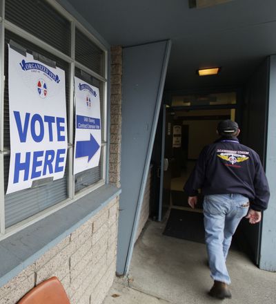 A Boeing Co. worker walks into the Machinists Union hall in Renton, Wash., on Wednesday. Boeing employees were voting on a four-year labor contract. (Associated Press)
