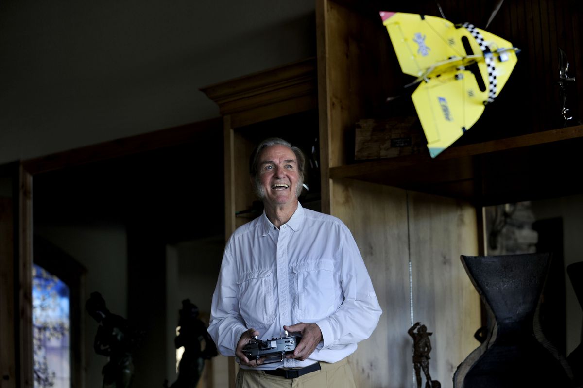 Burt Rutan flies his radio-controlled, tethered model airplane at his home in Coeur d’Alene on Aug. 15. He now envisions developing a hybrid plane that could also navigate rivers and lakes. (Kathy Plonka)