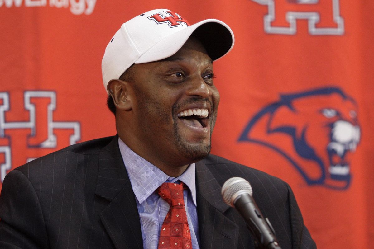 Kevin Sumlin laughs during a news conference introducing him as the new football coach at Houston  Dec. 14, 2007, in Houston. Sumlin had spent the last five years on Bob Stoops’ staff at Oklahoma. (David J. Phillip / ASSOCIATED PRESS)