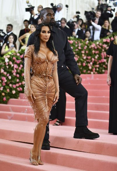 Kim Kardashian, left, and Kanye West attend The Metropolitan Museum of Art’s Costume Institute benefit gala celebrating the opening of the “Camp: Notes on Fashion” exhibition on Monday, May 6, 2019, in New York. Kardashian West tweeted Friday, May 10, 2019, their fourth child was born Thursday, May 9. (Charles Sykes / Invision/Associated Press)