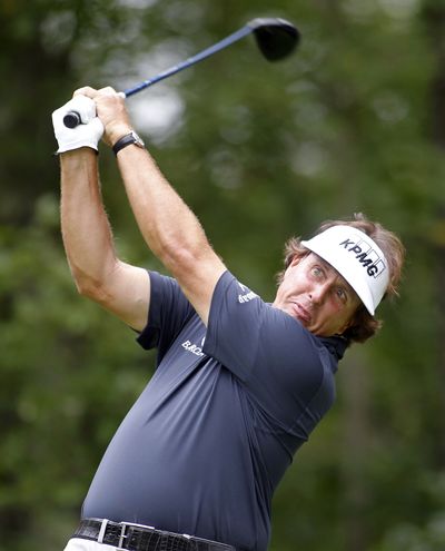 Phil Mickelson shot a first-round 8-under 63 to share the lead. (Associated Press)