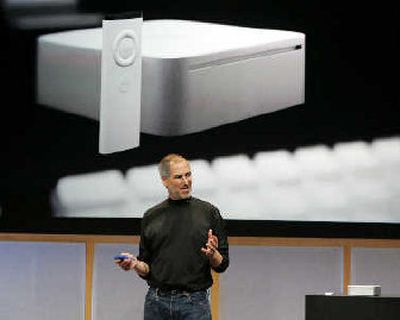 Apple Computer Inc. CEO Steve Jobs announces a revamped Mac Mini at an unveiling at Apple headquarters in Cupertino, Calif., on Tuesday. 
 (Associated Press / The Spokesman-Review)