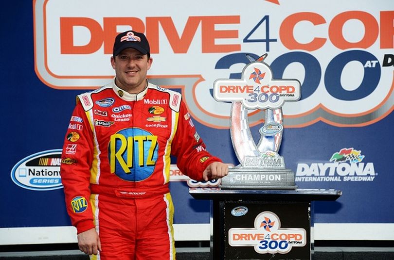 Tony Stewart, driver of the #33 Oreo/Ritz Chevrolet, poses with the trophy after winning the NASCAR Nationwide Series DRIVE4COPD 300 at Daytona International Speedway on February 23, 2013 in Daytona Beach, Florida. (Photo Credit: John Harrelson/Getty Images for NASCAR) (John Harrelson / Nascar)