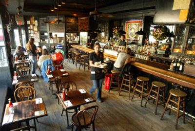 
Tables were almost all empty and only one customer sat at the bar Wednesday during lunch hour at Kenn's Broome St. Bar, as the New York City transit strike entered its second day. 
 (Associated Press / The Spokesman-Review)
