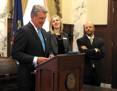 From left, Gov. Butch Otter, new Idaho public records ombudsman Cally Younger, and Newspaper Association of Idaho lobbyist Jeremy Pisca in the governor’s office on Wednesday. (Betsy Z. Russell)