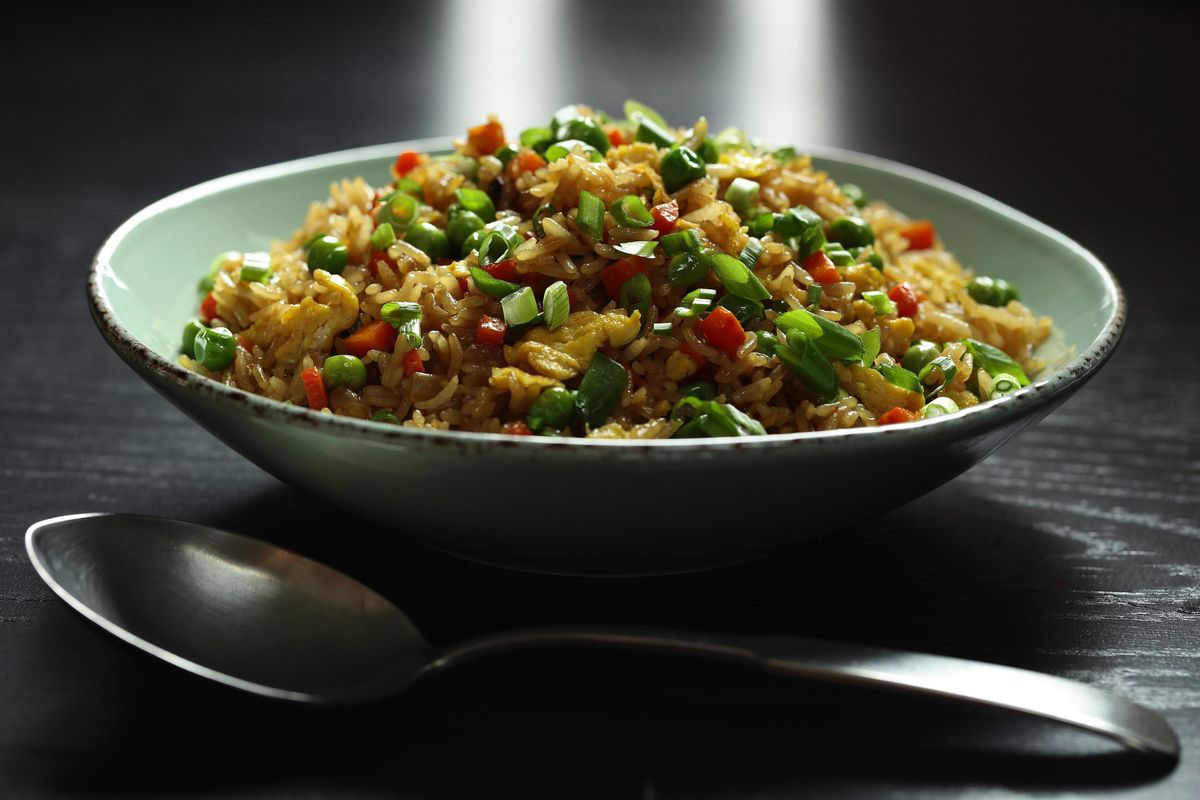 Leftover Chinese food from a Christmas feast inspired James P. DeWan to teach readers how to make crave-worthy fried rice. (Abel Uribe / Chicago Tribune)