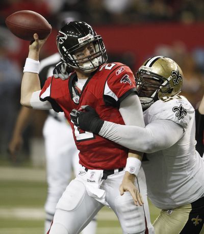 Atlanta Falcons quarterback Matt Ryan is sacked by New Orleans Saints' Jimmy Wilkerson.  (Associated Press)