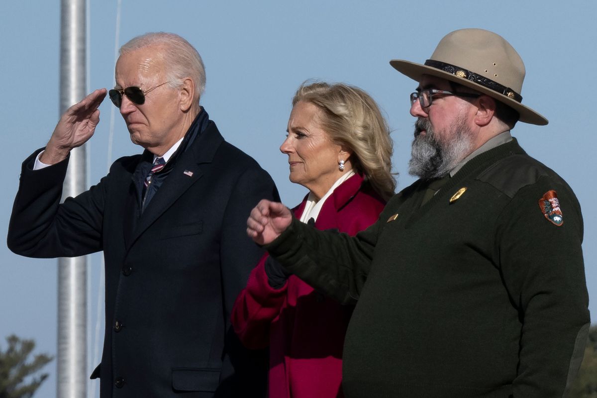 President Joe Biden and First Lady Jill Biden participate in a memorial wreath ceremony at the National Memorial Arch at Valley Forge National Historic Park in Valley Forge, Pa., Friday, Dec. 5, 2024.  (Jose F. Moreno/The Philadelphia Inquirer/TNS)