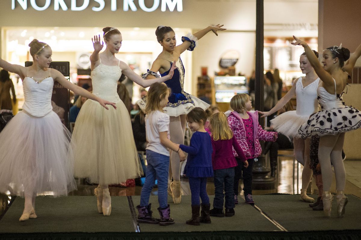 To promote the upcoming production of “The Nutcracker,” which lands at The Fox starting next Thursday, dancers from local ballet studios performed with children from the crowd at River Park Square last Saturday. (Colin Mulvany)