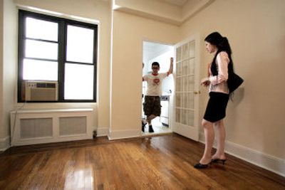 
Real estate saleswoman Amanda Rosenberg, right, shows James Conaboy a studio apartment in the East Village neighborhood of Manhattan this week. 
 (Associated Press / The Spokesman-Review)