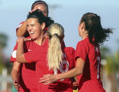 Canada’s Christine Sinclair, front left, celebrates with teammates after scoring against St. Kitts and Nevis during a CONCACAF women’s Olympic qualifying soccer match Wednesday, Jan. 29, 2020, in Edinburg, Texas. (Joel Martinez / Monitor via AP)