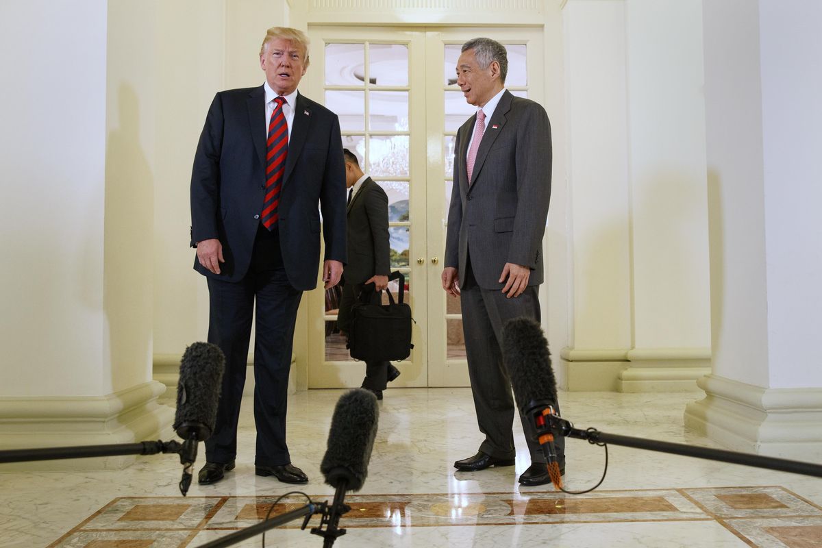 President Donald Trump meets with Singapore Prime Minister Lee Hsien Loong ahead of a summit with North Korean leader Kim Jong Un, Monday, June 11, 2018, in Singapore. (Evan Vucci / Associated Press)