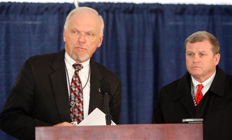 Idaho Department of Corrections Director Brent Reinke, left, and Idaho Attorney General Lawrence Wasden answer questions at a news conference following the execution of Paul Ezra Rhoades at Idaho's Maximum Security Institution in Boise, Idaho on Friday morning Nov. 18, 2011. (AP Photo / Joe Jaszewski)