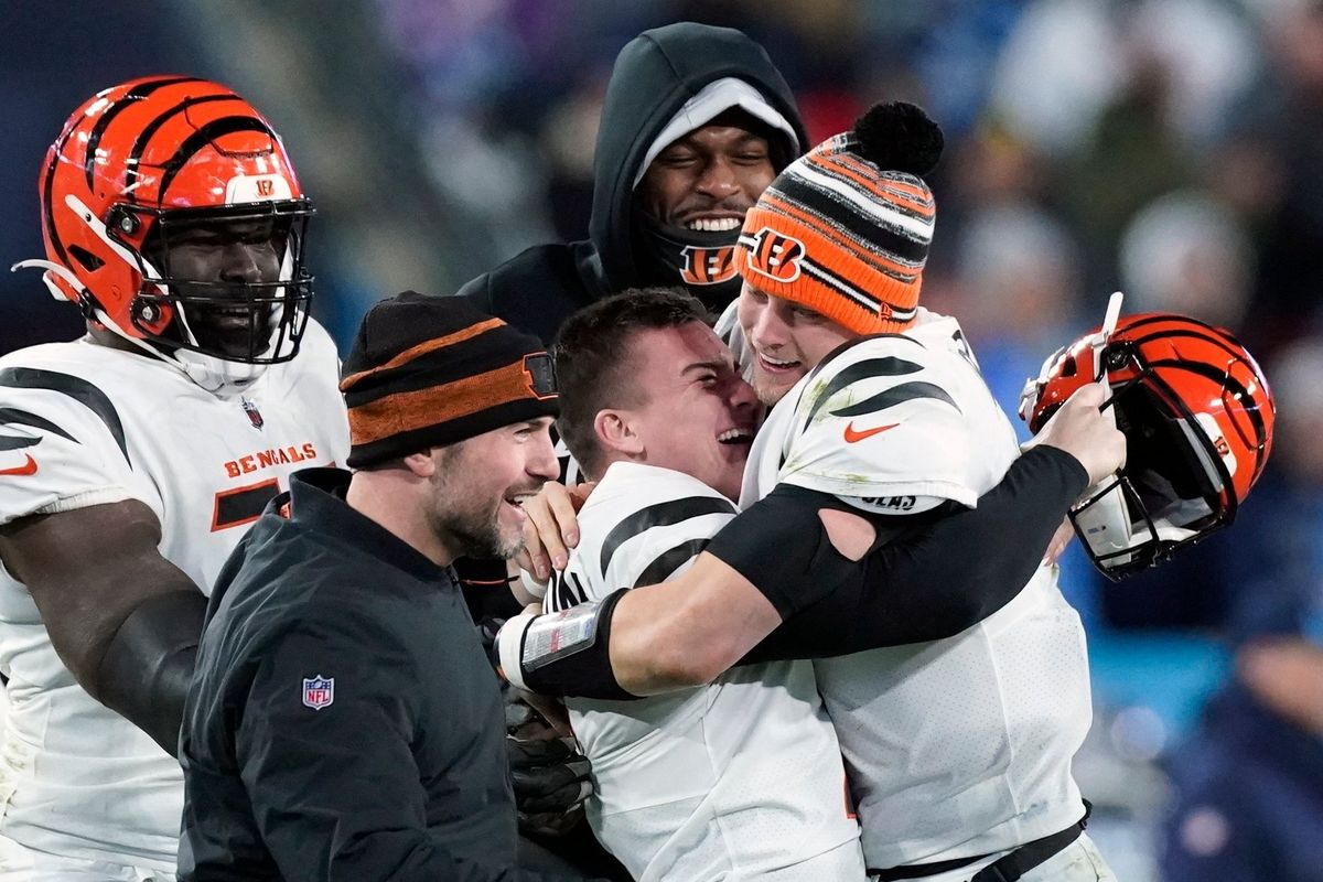 Cincinnati Bengals kicker Evan McPherson (2) celebrates his game-winning field goal against the Tennessee Titans with Cincinnati Bengals quarterback Joe Burrow (9) after an NFL divisional round playoff football game Saturday in Nashville, Tenn. The Cincinnati Bengals won 19-16.  (Associated Press)
