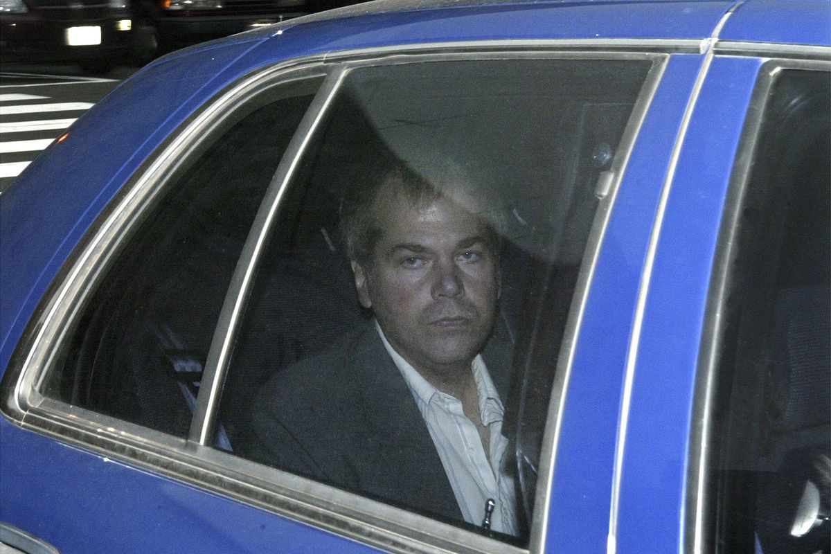 FILE - In this Nov. 18, 2003, file photo, John Hinckley Jr. arrives at U.S. District Court in Washington. Lawyers for Hinckley, the man who tried to assassinate President Ronald Reagan, are scheduled to argue in court Monday, Sept. 27, 2021, that the 66-year-old should be freed from restrictions placed on him after he moved out of a Washington hospital in 2016.  (Evan Vucci)