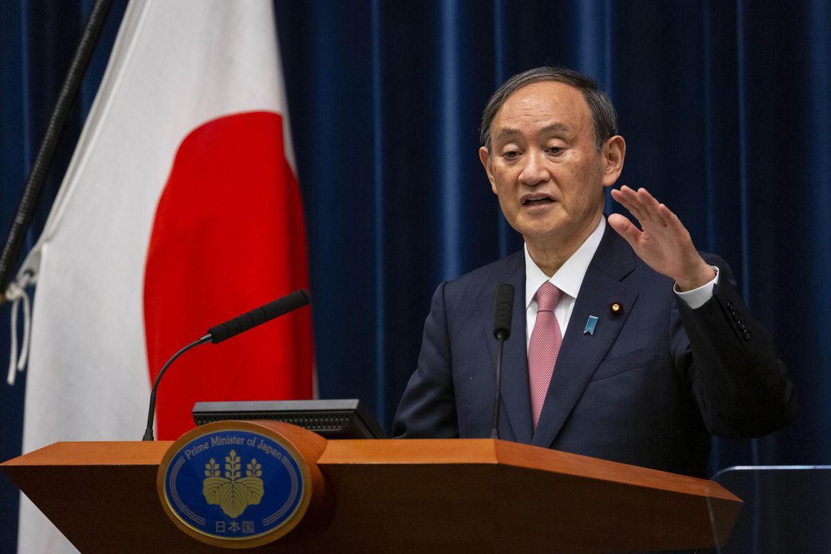 Japanese Prime Minister Yoshihide Suga speaks during a press conference at the prime minister