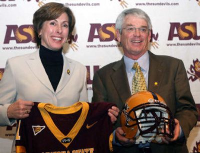 
Arizona State athletic director Lisa Love and Dennis Erickson are all smiles Monday as he's introduced as the Sun Devils' new football coach in Tempe, Ariz. 
 (Associated Press / The Spokesman-Review)