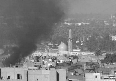 
Smoke rises over an area where U.S. and Iraqi troops clashed with gunmen in a Sunni insurgent stronghold north of the heavily fortified Green Zone in Baghdad, Iraq, on Wednesday. 
 (Associated Press / The Spokesman-Review)
