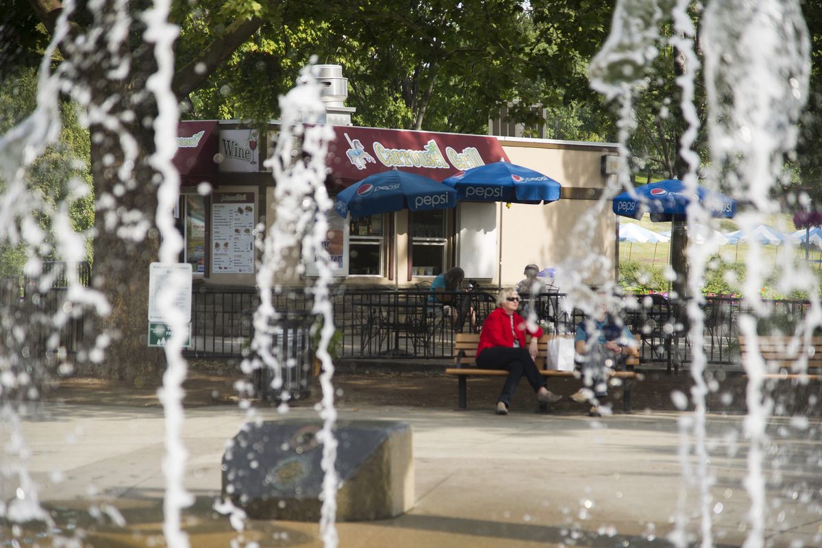 The Park Board has agreed to spend money to plan a permanent building for restrooms and concessions near the Riverfront Park fountain. (Colin Mulvany)