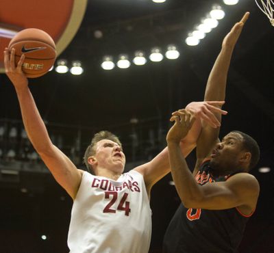 Josh Hawkinson scored 26 in Cougars’ win over Idaho State. (Associated Press)